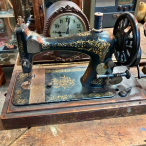 Máquina de costura Singer portátil